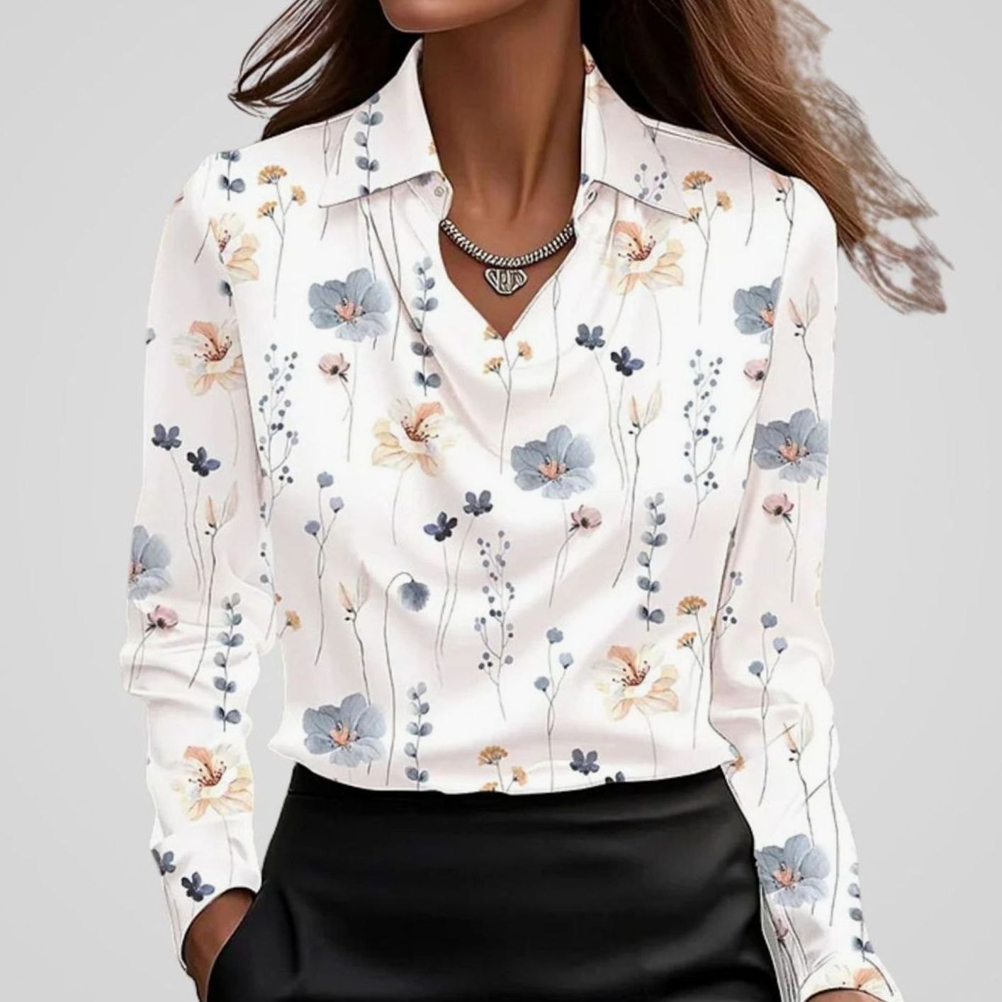 Blusa azul marino con cuello estructurado en punta